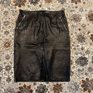 Classiques Entier beautiful, soft black leather skirt with gold zipper detail.
